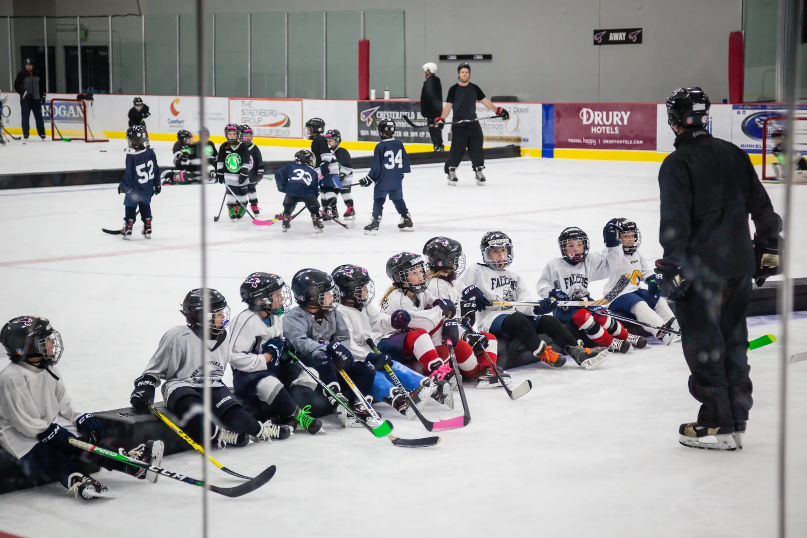 Youth hockey players on the ice